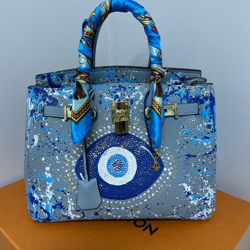 Vibrant Blue Shoulder Bag with Evil Eye Charm